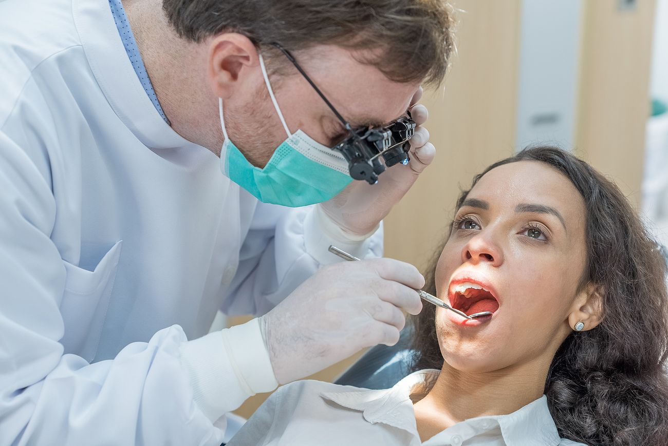 Dentist Armadale examining a patient’s teeth